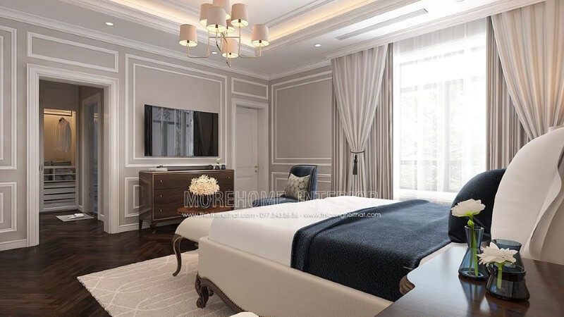 Thiết kế nội thất phòng ngủ tân cổ điển có tủ quần áo đối diện giường ngủ khoa học, phong thủy.