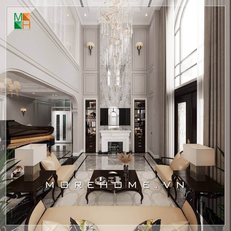 Cách bày trí không gian phòng khách rất tinh tế từ việc sử dụng đèn thả sang trọng, mọi thứ đều hài hòa và phù hợp với phong cách phòng khách tân cổ điển.