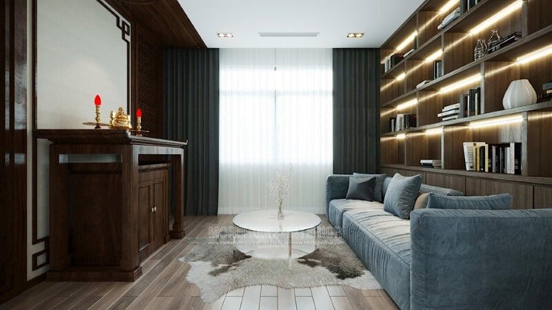 Sofa hiện đại bọc nỉ màu xanh được đặt ở phòng thờ sẽ làm cho không gian trở nên yên tĩnh và tinh tế, đồng thời cung cấp một nơi hoàn hảo để chú tâm đọc sách.